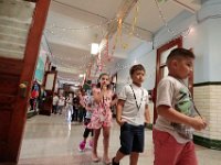 John B. Devalles elementary school students walk to class past the decorative lights hanging from the ceiling, as students across New Bedford return to school.  [ PETER PEREIRA/THE STANDARD-TIMES/SCMG ]